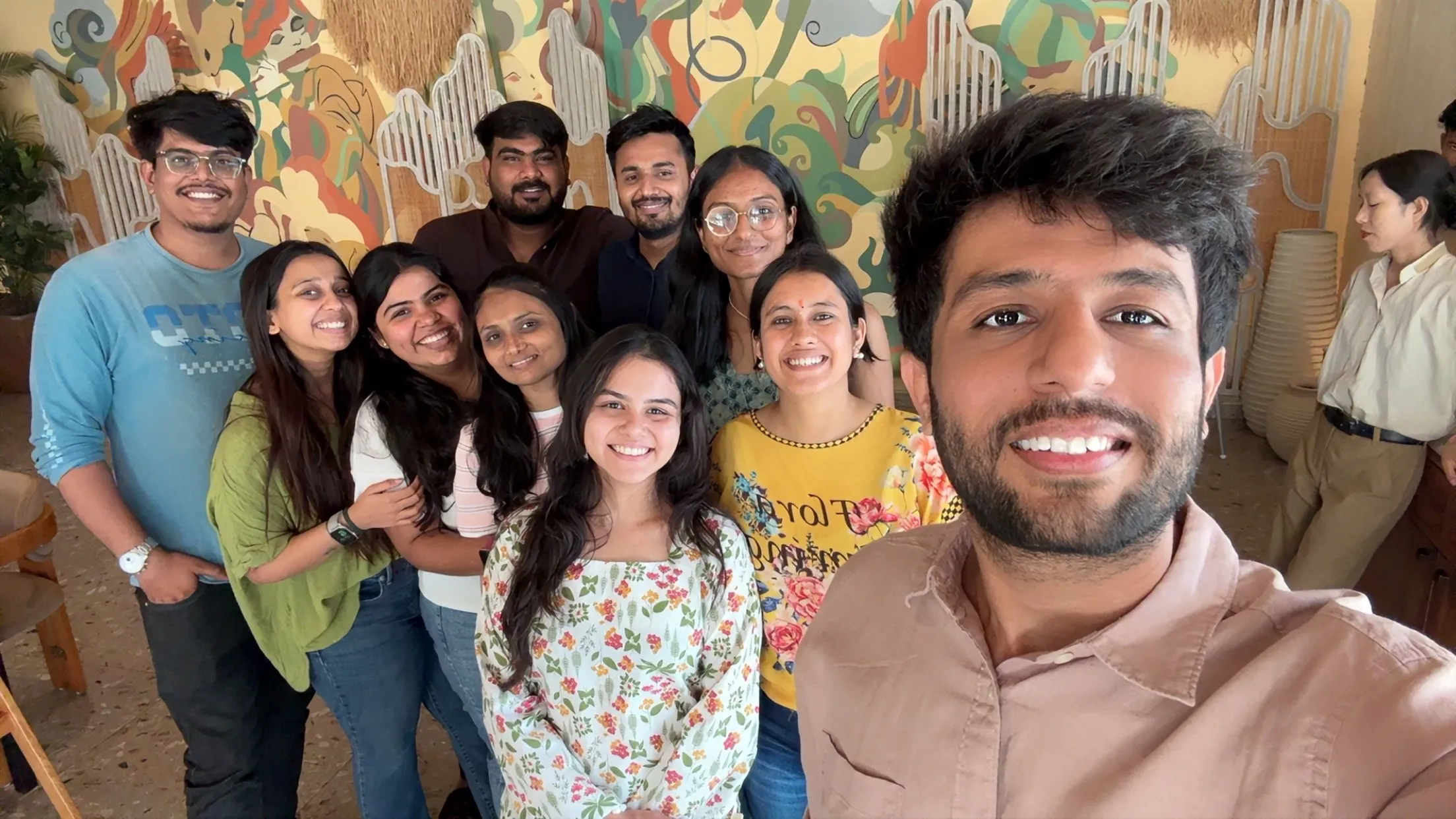 The team together in a cafe