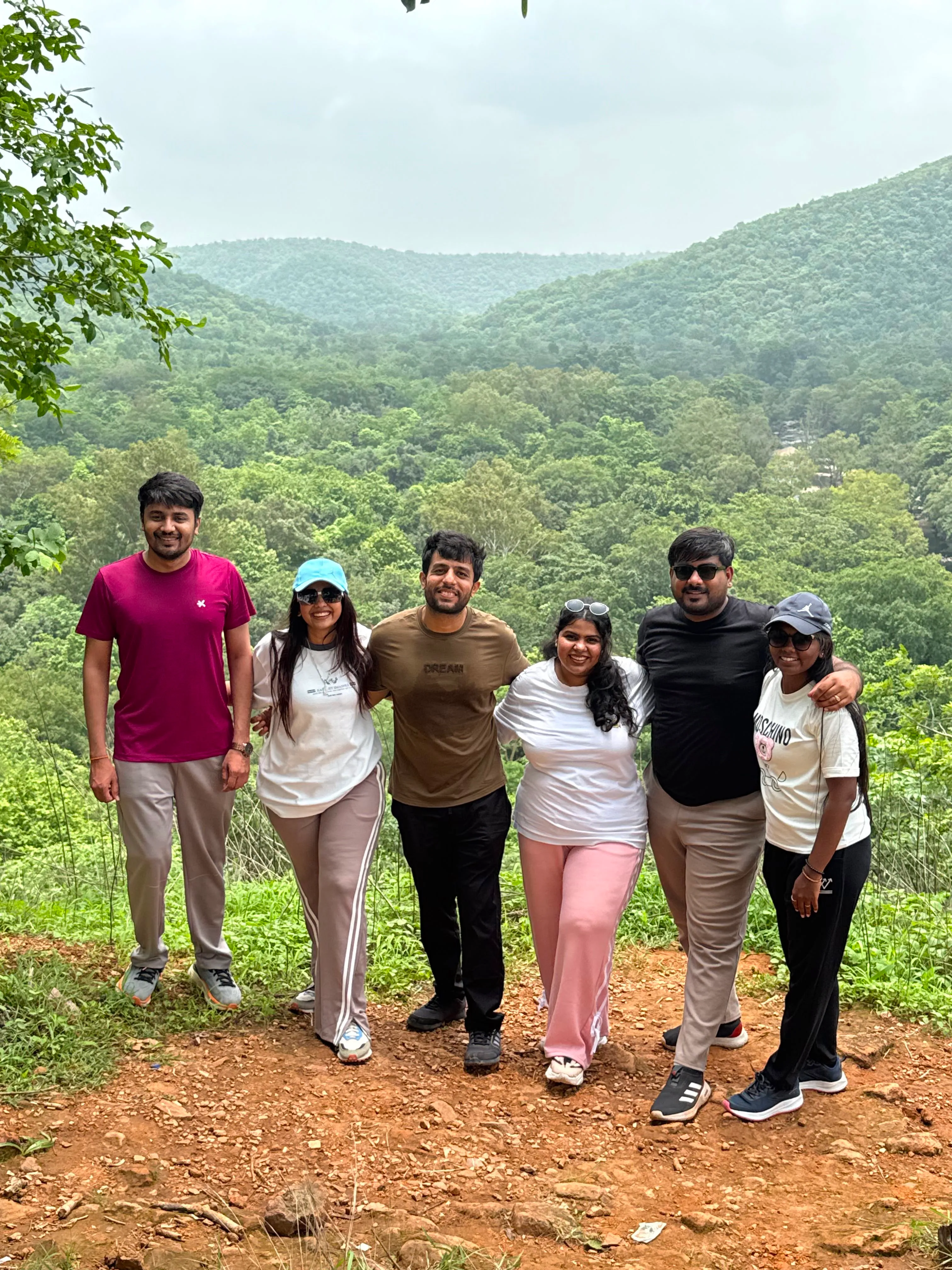 Haytriox teammates on a hillside trail