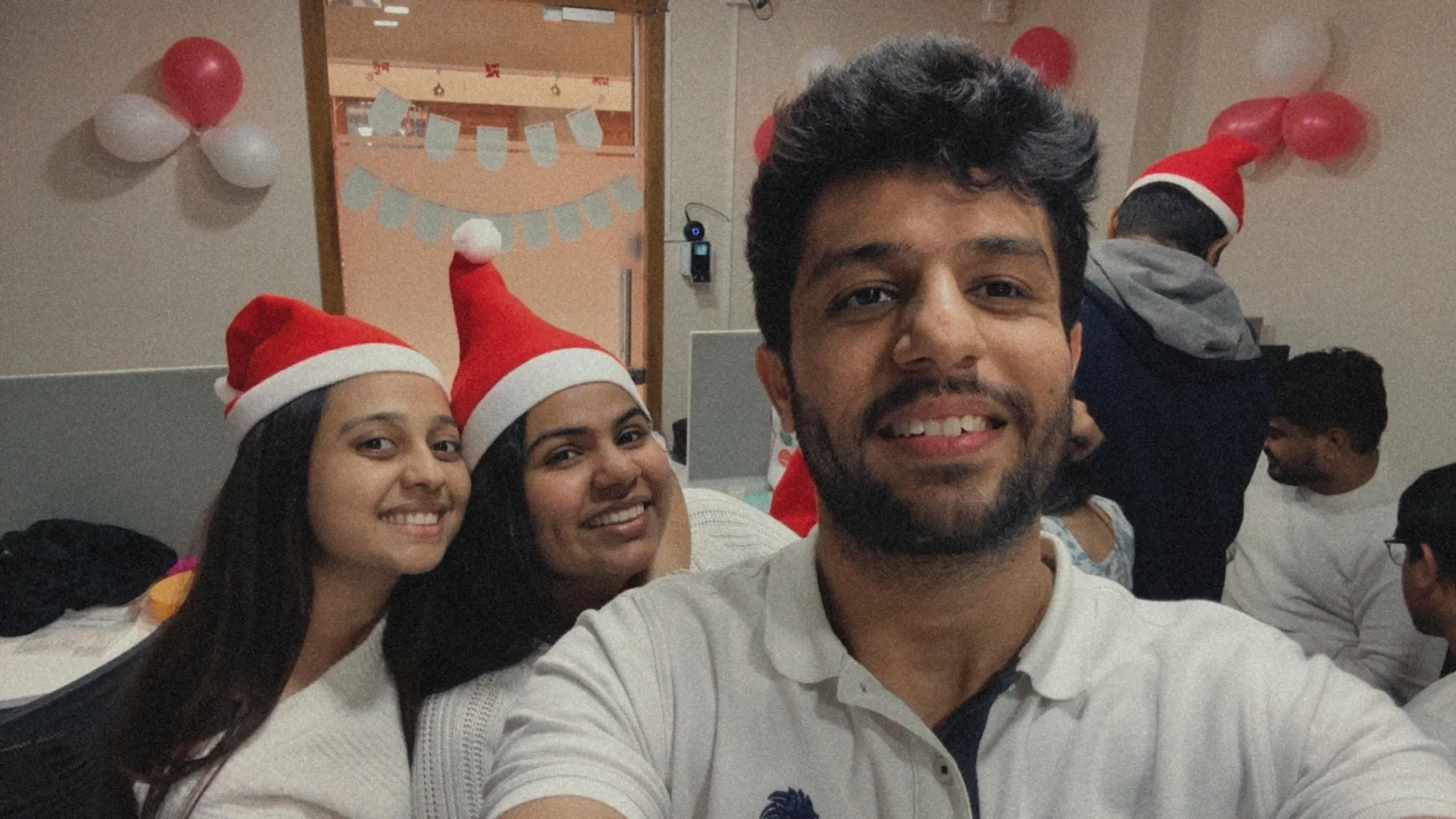 Teammates celebrating in the office