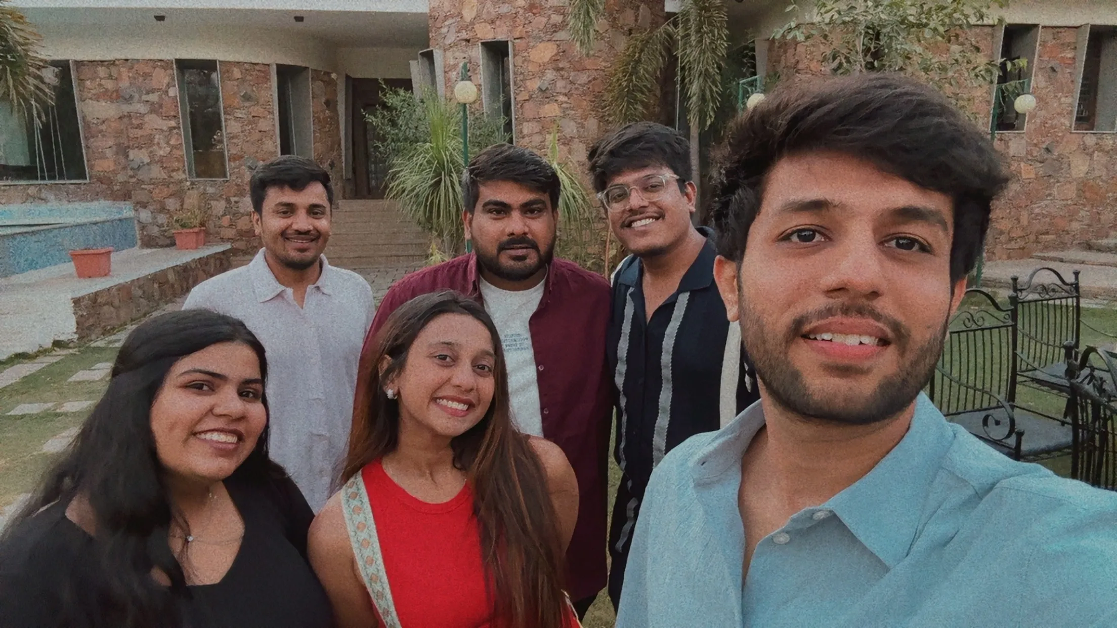 The team outdoors on an evening together